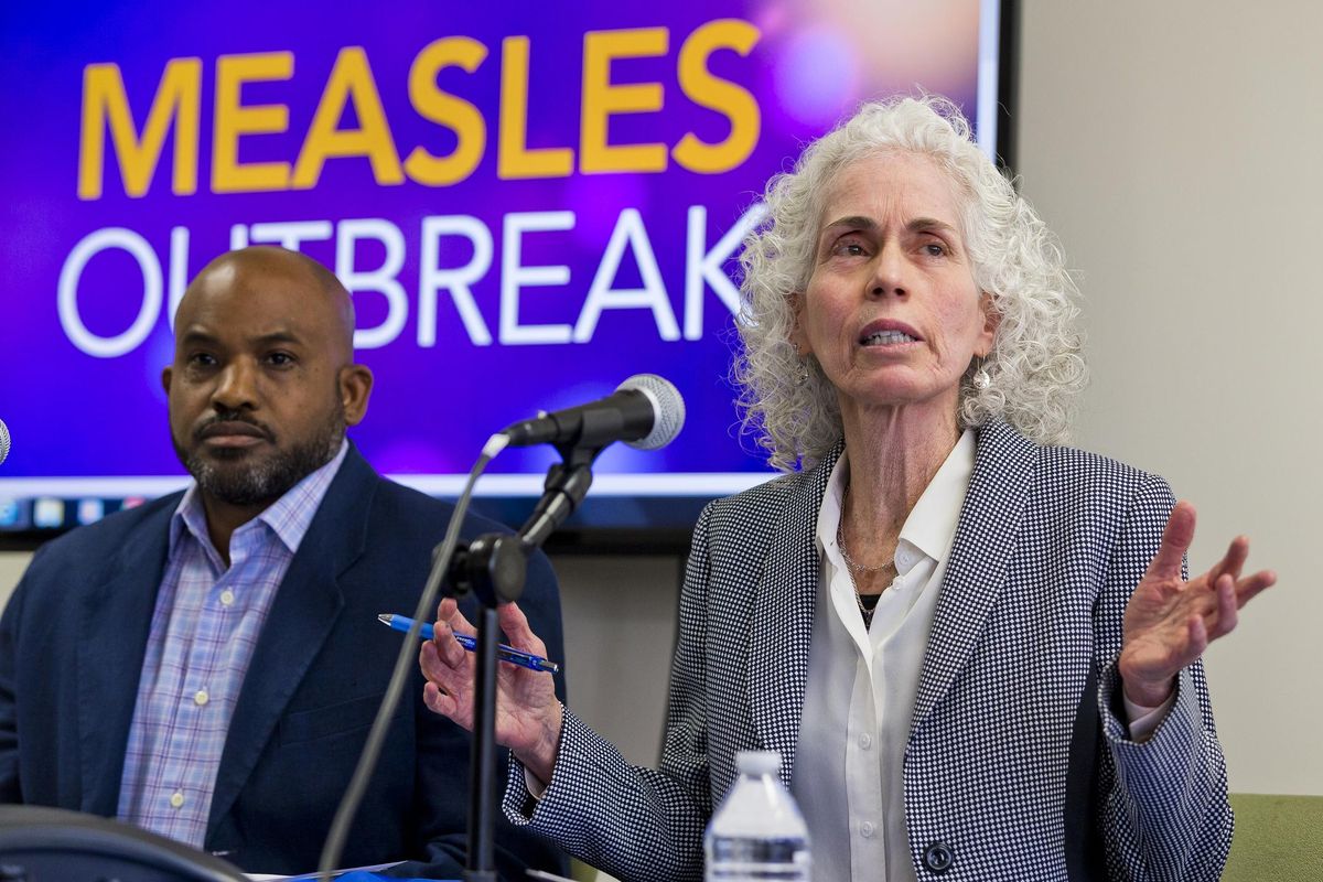 Los Angeles County Department of Public Health experts, Muntu Davis, Health Officer, left, and Director Dr. Barbara Ferrer answer questions regarding the measles response and the quarantine orders during a news conference in Los Angeles Friday, April 26, 2019. Hundreds of students and staff members at two Los Angeles universities were sent home this week in one of the most sweeping efforts yet to contain the spread of measles in the United States, where cases have reached a 25-year high. (Damian Dovarganes / Associated Press)