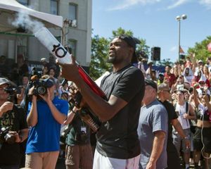 Kevin Durant shoots T-shirts into the crowd at Hoopfest’s Center Court, Sunday, June 25, 2017. (Colin Mulvany / The Spokesman-Review)
