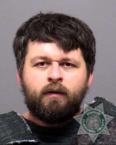 This undated photo provided by the Clackamas County Sheriff's office shows Robert Hilands. The 33-year-old man has been charged with aggravated murder in connection to a double homicide on his property in Beavercreek, Ore., Tuesday. (Uncredited / Clackamas County Sheriff's Office via Associated Press)