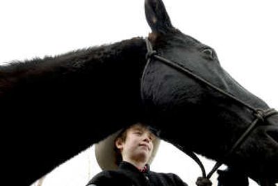 
Jacob Paul, 12, is pictured with his horse, Teddy, at his Post Falls. Jacob is involved in rodeo and recently finished second in his age group for the state of Washington in the Wrangler Junior High Division at a ride in Ellensberg.
 (Kathy Plonka / The Spokesman-Review)