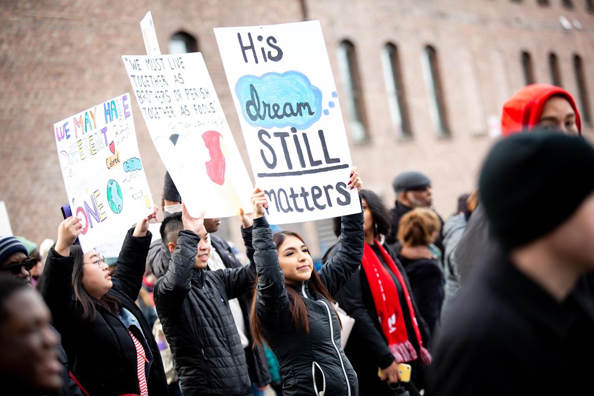 A crowd marches to honor the legacy of Martin Luther King Jr. in downtown Spokane on Monday, Jan. 20, 2020. The march followed a rally at the Spokane Convention Center. (Libby Kamrowski / The Spokesman-Review)