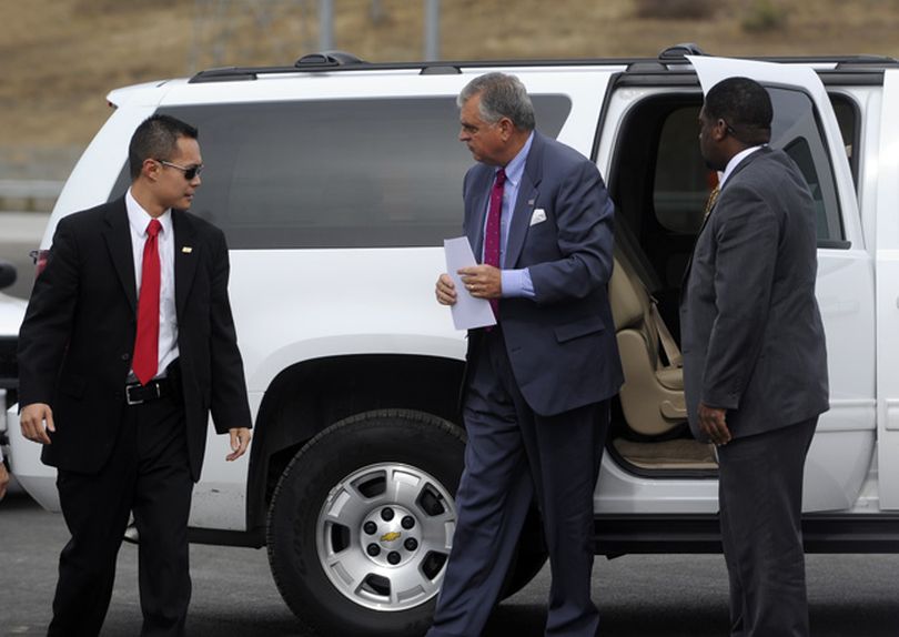 U.S. Secretary of Transportation Ray LaHood on Tuesday, Sept. 7, 2010, exits a Chevy Suburban on his way to speak at a ceremony marking the start of construction of the southbound lanes of the North Spokane Corridor between Francis Avenue and Farwell Road. The event was held on land that will serve as the soutbound lanes near a railroad tunnel that goes under the freeway. (Jesse Tinsley)