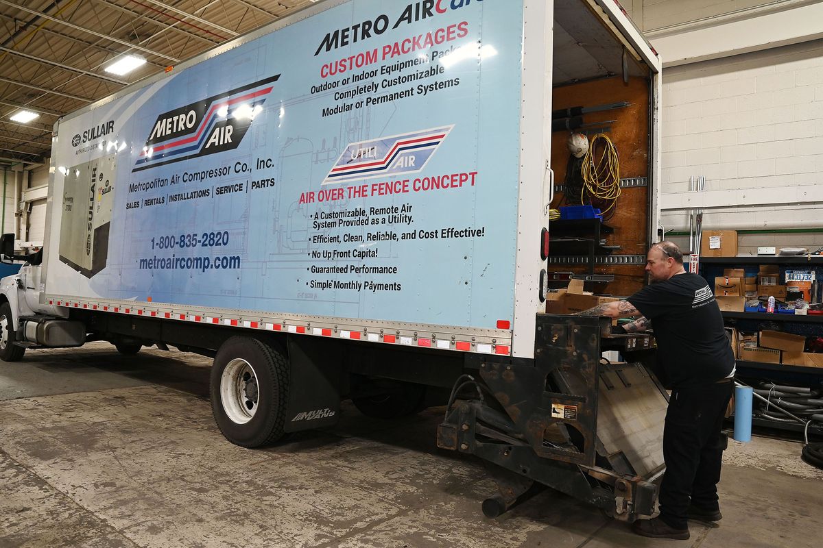 Will Estep, 45, Install Lead at Metropolitan Air Compressor, works on the Metropolitan Air Compressor trailer on March 14, 2024, in Roseville, Michigan.    (Clarence Tabb Jr./The Detroit News/TNS)