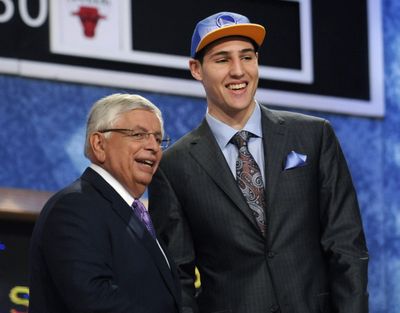 NBA Commissioner David Stern poses with the No. 11 overall draft pick, Washington State guard Klay Thompson, who was selected by the Golden State Warriors in the NBA basketball draft Thursday, June 23, 2011, in Newark, N.J. (Mel Evans / Associated Press)