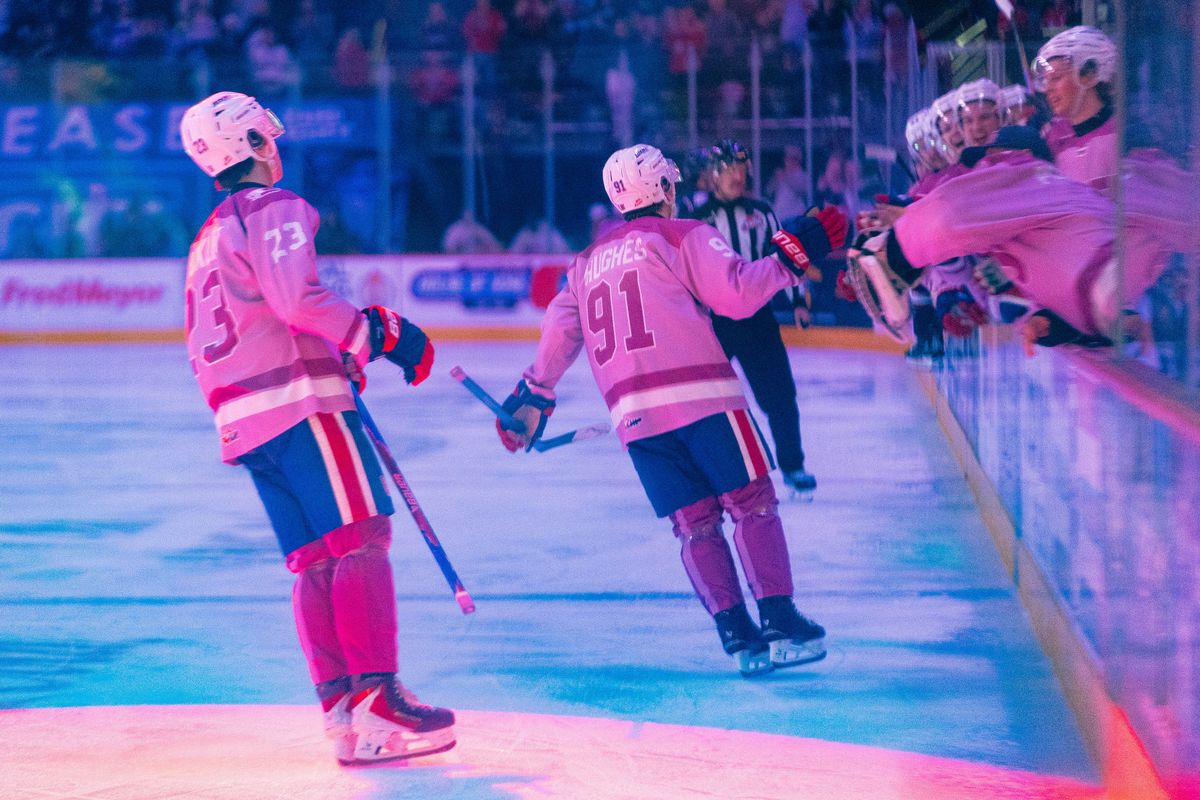Spokane Chiefs forward Ethan Hughes celebrates his second period goal against the Tri-City Americans on Feb. 28, 2026 at the Arena. The Chiefs wore pink uniforms as part of "Chiefs Fight Cancer" night. Hughes beat Stage 1 kidney cancer as a 10-year-old.  (Larry Brunt)