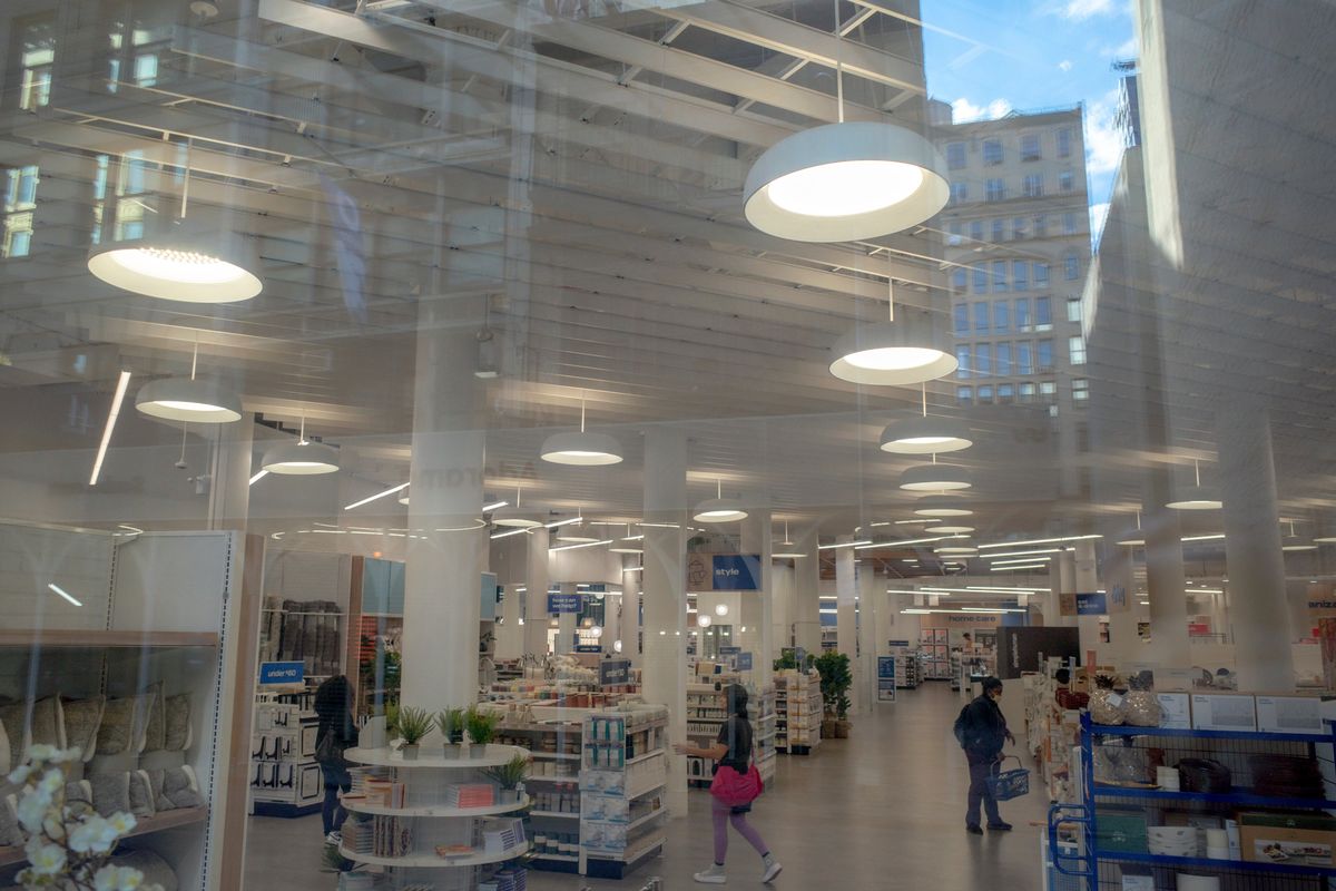 Shoppers mill about the Bed Bath & Beyond location on Sixth Avenue in Chelsea, Manhattan, on Sept. 27. A difficult holiday season for retailers could lead to restructurings and layoffs in 2023. (New York Times)