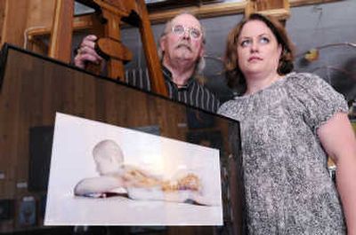 
Photographer Jennifer Harvey, right, and painter Bill Edge, left, have cooperated on a series of images where Edge paints a model's body and Harvey potographs the model afterward. The images are going up at the Artist's Tree gallery on Sprague Avenue in downtown Spokane for the First Friday event, June 6.
 (Jesse Tinsley / The Spokesman-Review)