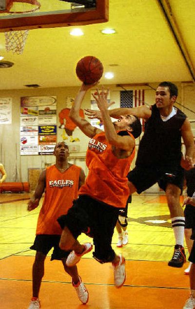 West Valley's Danny McIntyre goes up for the shot during an after school practice in November.
(Liz Kishimoto / The Spokesman-Review)