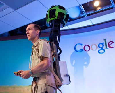 Luc Vincent, Google engineering director, demonstrates how the company captures images in hard-to-reach places with Street View Trekker. Google's digital mapping service is preparing to introduce offline access on mobile devices and more three-dimensional images of major cities as it braces for a possible loss in traffic from Apple's iPhone and iPad. (Associated Press)