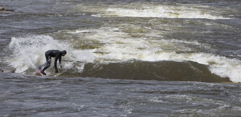 The WaveShaper feature in the Deschutes River at the Bend Whitewater Park in Oregon. (Andy Tullis / Bend Bulletin)