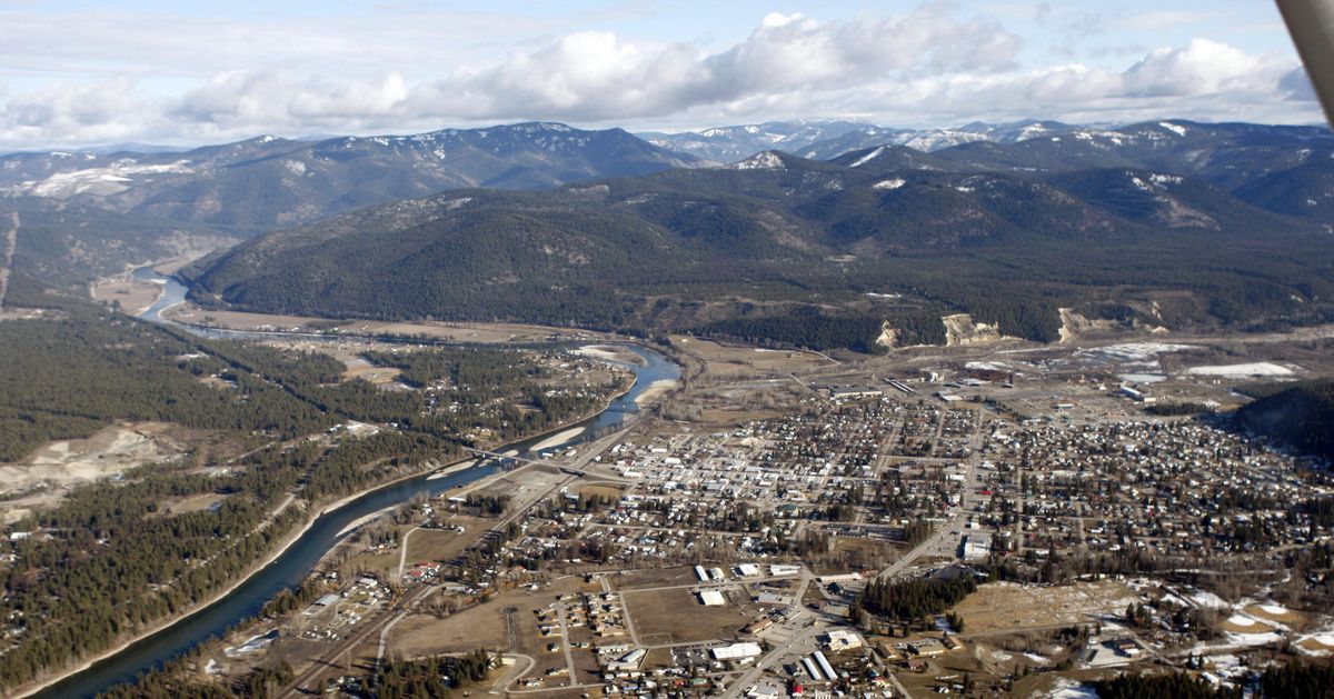 In this file photo taken Feb. 17, 2010, the town of Libby, Mont., is shown.  More than 20 years after the W.R. Grace mine near Libby closed, results of new testing show huge loads of asbestos pouring down the creeks inside the exposed mine site during spring runoff. (Rick Bowmer / AP)