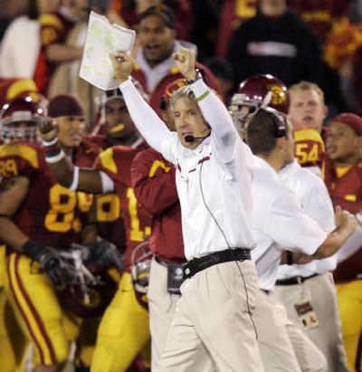Coach Pete Carroll's USC Trojans, preparing for Cal, have dreams of a Pac-10 title and possible national championship. 
 (Associated Press / The Spokesman-Review)