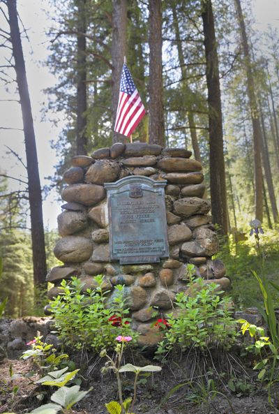 A mass grave in the Wallace Idaho Ninemile cemetary marks the final resting place of five men killed in the 1910 fire. (Christopher Anderson / The Spokesman-Review)