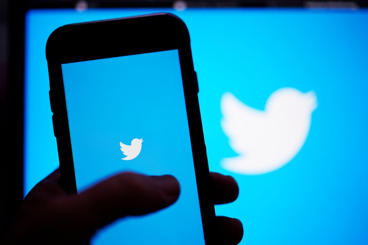 FILE - The Twitter application is seen on a digital device, April 25, 2022, in San Diego. Elon Musk, the world's richest man and the owner of SpaceX and Tesla, says he is a free speech absolutist who doesn't support the kind of content moderation that saw people like ex-President Donald Trump get banned for inciting violence.  (Gregory Bull)
