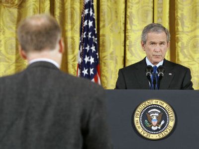
President Bush listens to a reporter's question during a news conference in the White House on Wednesday. 
 (Associated Press / The Spokesman-Review)
