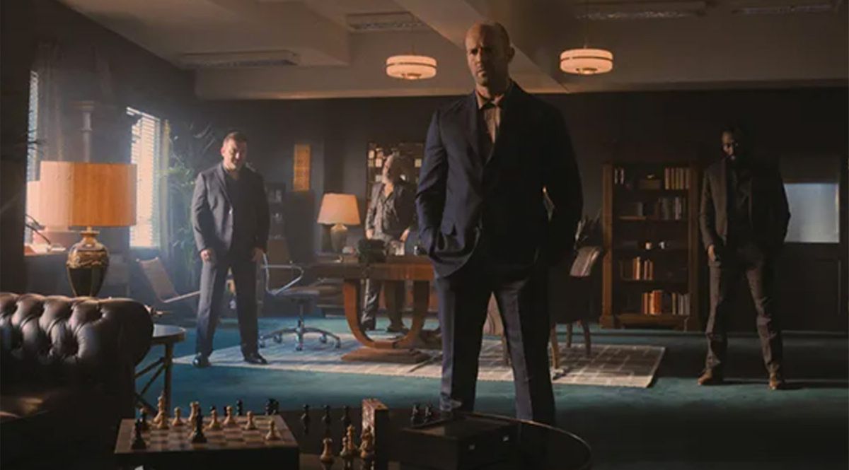 Jason Statham, center, stars in "Wrath of Man."  (MGM)