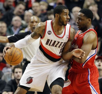 Trail Blazers forward LaMarcus Aldridge has remained healthy and has 21 double-doubles this season. (Associated Press)