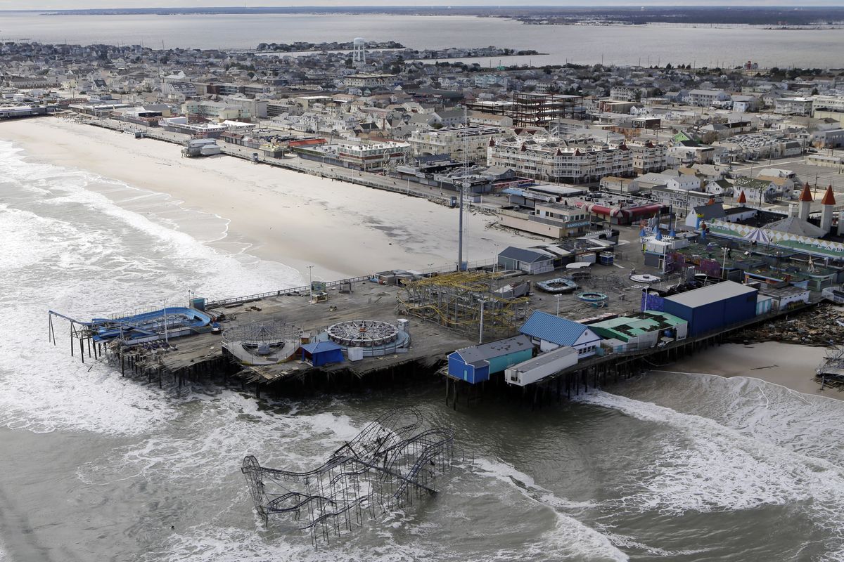 This aerial photo shows the damage to an amusement park left in the wake of superstorm Sandy on Wednesday, Oct. 31, 2012, in Seaside Heights, N.J. New Jersey got the brunt of Sandy, which made landfall in the state and killed six people. More than 2 million customers were without power as of Wednesday afternoon, down from a peak of 2.7 million. (Mike Groll / Associated Press)