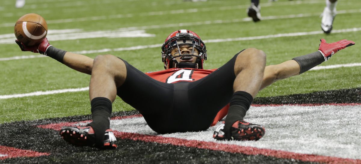 Louisiana-Lafayette’s Javone Lawson celebrates his go-ahead touchdown catch in the third quarter on Saturday. (Associated Press)