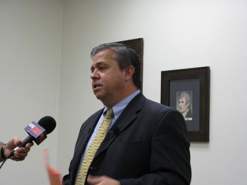Talking to reporters, Idaho schools Supt. Tom Luna praises the budget state lawmakers set for public schools for next year on Monday morning. (Betsy Russell)