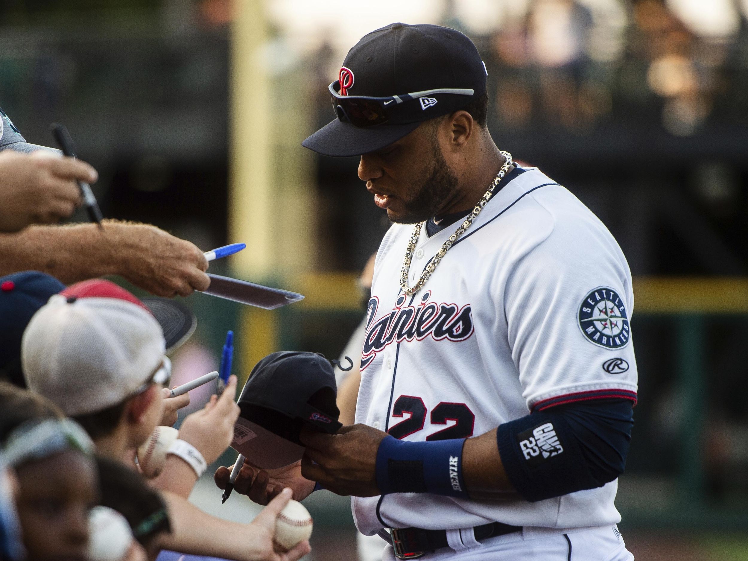 In return to baseball, Robinson Cano plays first base for Tacoma Rainiers,  has a hit