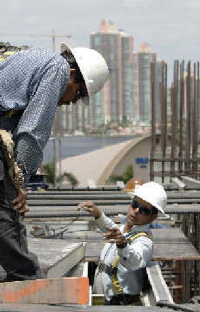 
On Tuesday, these immigrant construction workers were back at work near Miami. 
 (Associated Press / The Spokesman-Review)