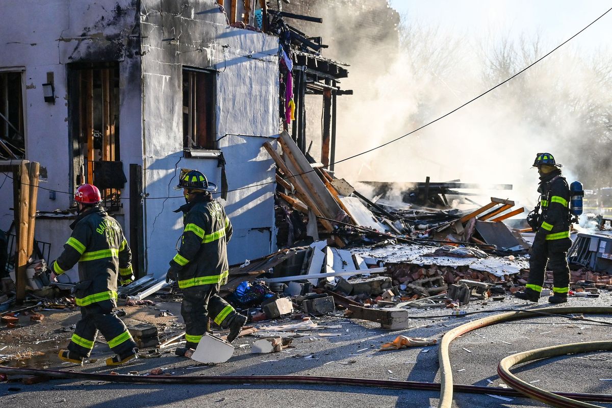 Baltimore firefighters at the scene of an explosion in Baltimore's Pigtown neighborhood on Tuesday, Nov. 22, 2022. (Jerry Jackson/Baltimore Sun/TNS)  (Jerry Jackson/Baltimore Sun/TNS)