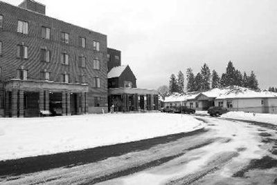 
The older building, at left, of Coeur d'Alene Homes site in contrast to the new building at right, a long, low building divided into apartments for the elderly. Coeur d'Alene Homes is a nonprofit organization that runs the home for the elderly and is an outgrowth of a Lutheran ministry. 
 (Jesse Tinsley / The Spokesman-Review)