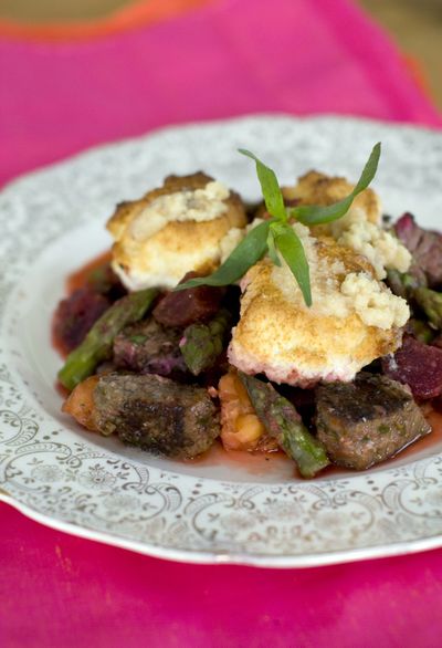 Valentine’s Day Surf and Turf Cobbler is thickened with a sweet puree of beets, instead of the usual butter, cream and flour. (Associated Press)