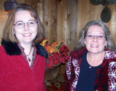 
Shelley Tschida, left, spokeswoman for the nonprofit group Youth Equipped for Success, and Tina Arendt, Waterford Park Marina general manager, take a break during Saturday's benefit dinner for YES.
 (Herb Huseland photo / The Spokesman-Review)