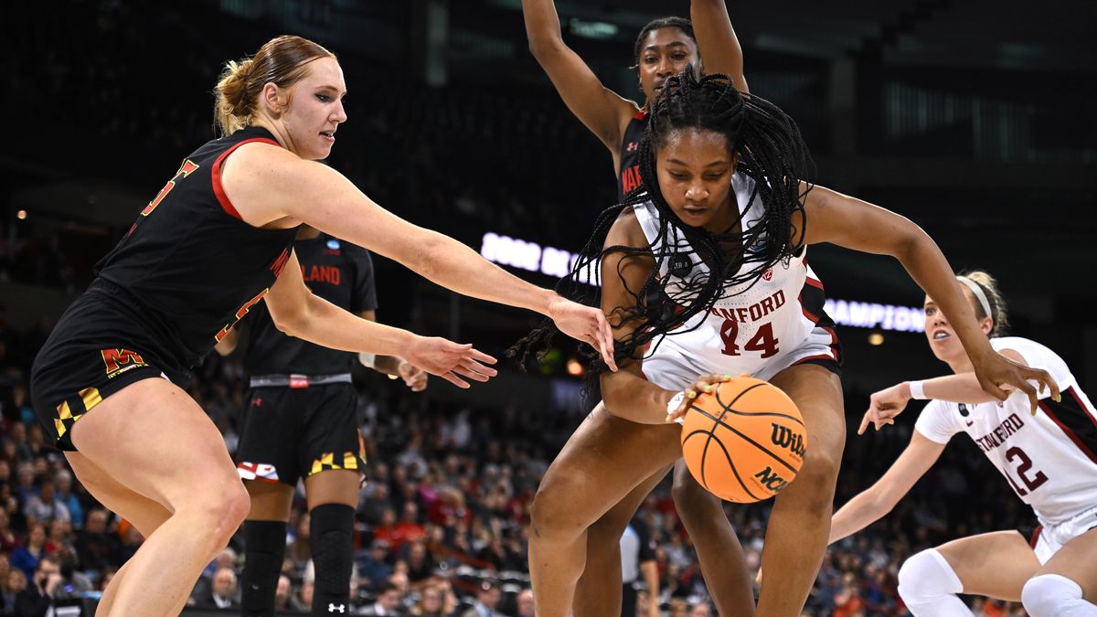 Stanford forward Kiki Iriafen (44) takes control of a rebound as Maryland forward Chloe Bibby (55) reaches in during second half of an NCAA women