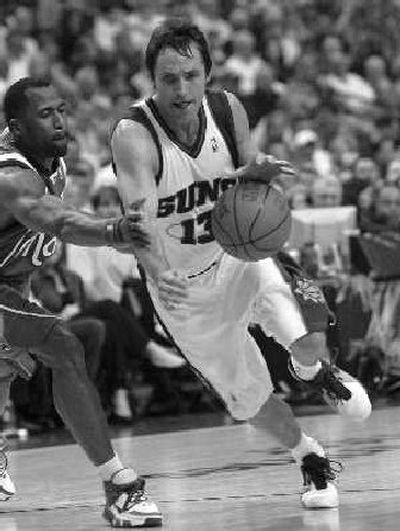 
Phoenix's Steve Nash is on pace to average at least 18 points and 11 assists per game.
 (Associated Press / The Spokesman-Review)