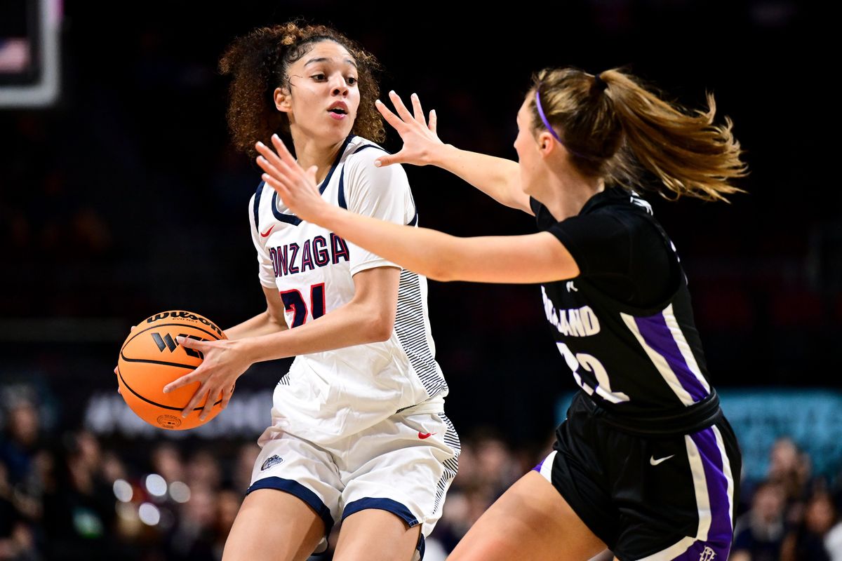 Gonzaga’s McKayla Williams looks to pass against Portland guard MJ Bruno during the first half of Tuesday’s WCC Tournament title game.  (Tyler Tjomsland/The Spokesman-Review)