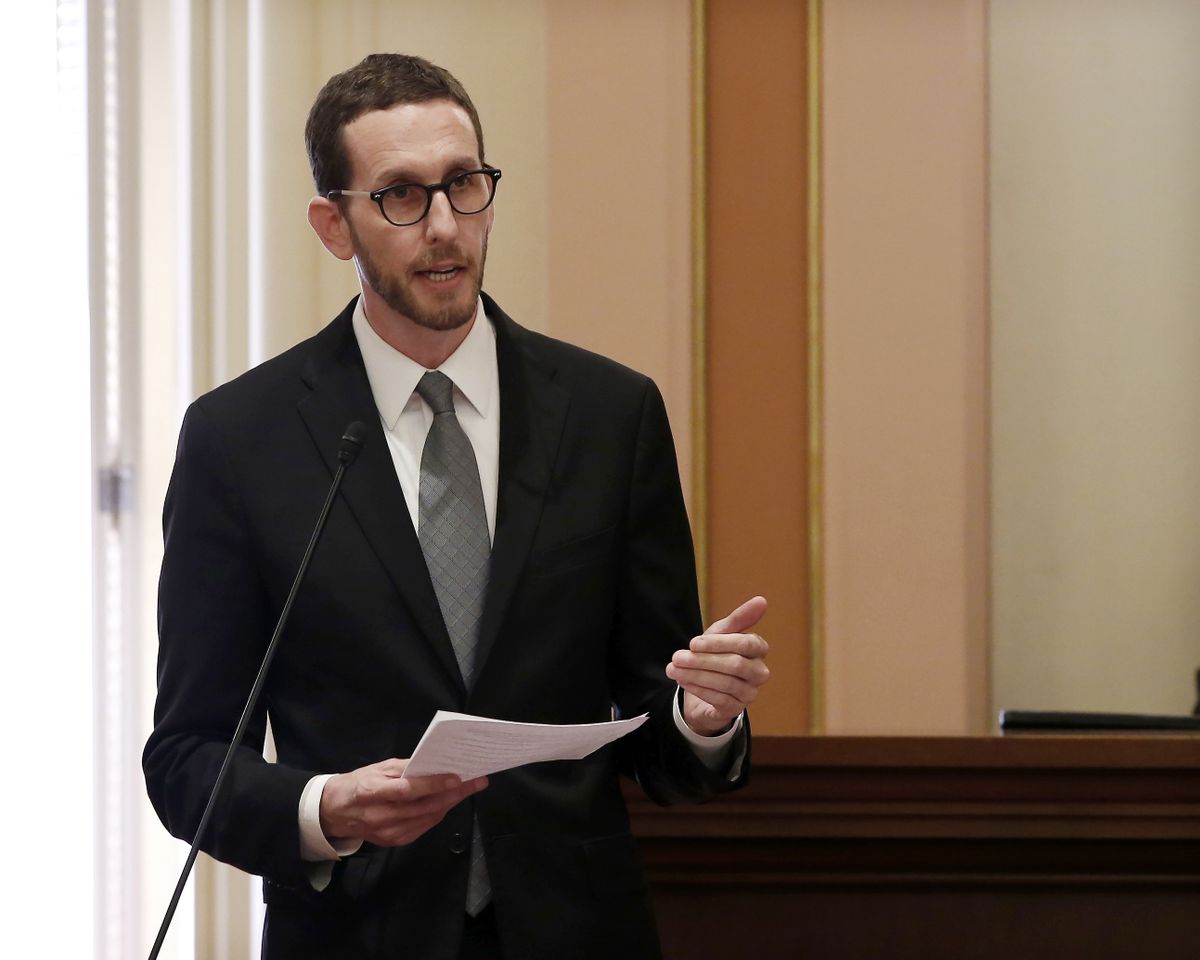 In this Sept. 12, 2019 photo, Democratic state Sen. Scott Wiener addresses the state Senate at the Capitol in Sacramento, Calif., Wiener has introduced a bill to pay people struggling with drug addiction to stay sober. People would earn small payments for every negative drug test over a set period of time. The measure has already passed the Senate without opposition and is pending in the Assembly.  (Rich Pedroncelli)