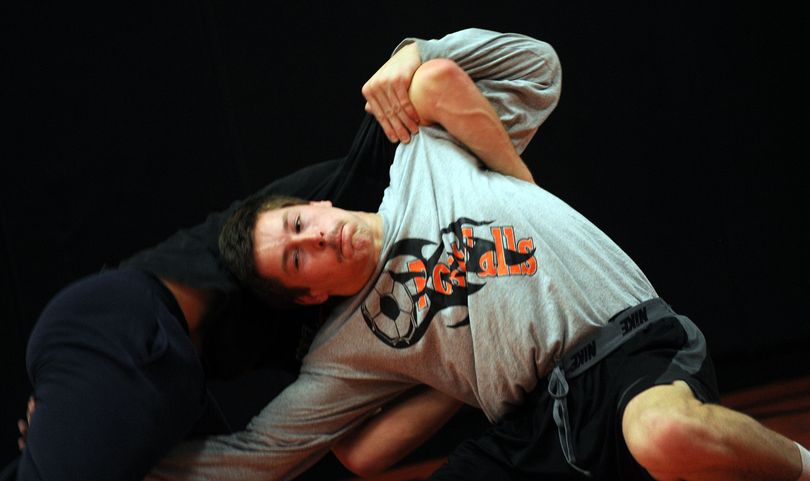 Defending state champion Cole Jesienouski, front, wrestles Nathan McLeod, who finished second last year, at practice. (Kathy Plonka)