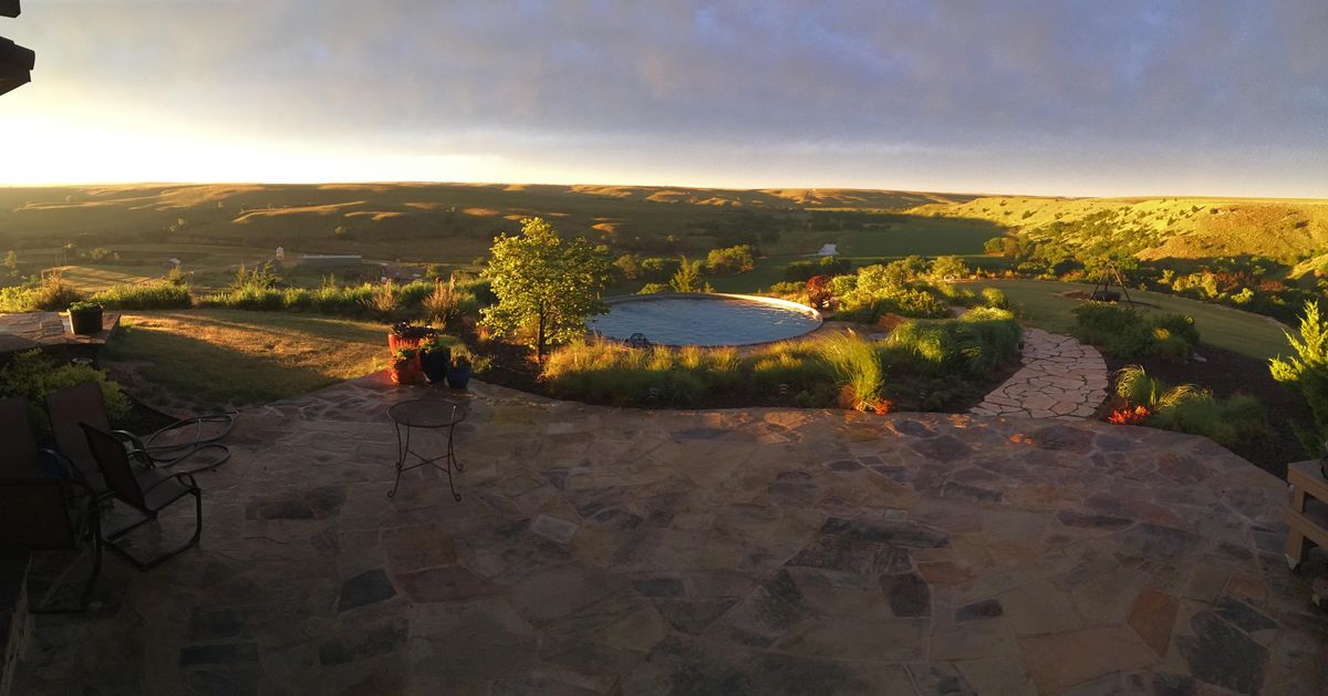 Kurt Kraisinger, a landscape architect and owner of Lorax Design, designed this outdoor space on a cattle ranch in Kansas featuring a round pool to resemble a stock tank. (Lorax Design / The Washington Post)