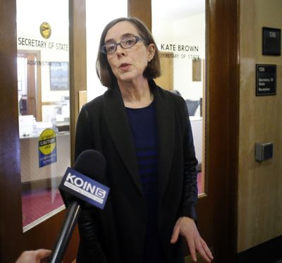 Oregon Secretary of State Kate Brown speaks to the media outside of her office at the Oregon Capitol in Salem on Friday. Brown will take over as governor after John Kitzhaber announced his resignation Friday. (Associated Press)