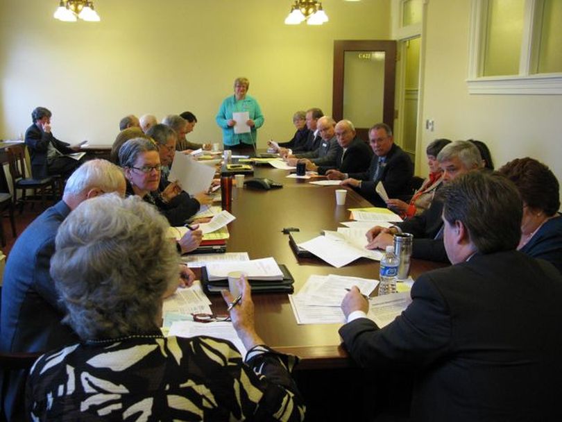 JFAC gathers for its 7 a.m. workshop meeting on Friday. Members were enthusiastic about a plan from two lawmakers to help balance the state budget by increasing state tax auditors to collect a net $16.4 million in now-uncollected taxes. (Betsy Russell)