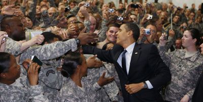 President Barack Obama greets troops Tuesday at Camp Victory in Baghdad.  (Associated Press / The Spokesman-Review)