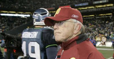 
Redskins coach Joe Gibbs is not certain if he will complete the remainder of his coaching contract with Washington. Associated Press
 (Associated Press / The Spokesman-Review)