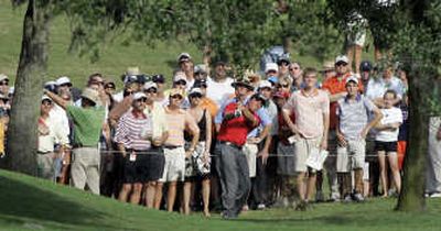 
Phil Mickelson hits out from under trees during the third round of The Players Championship.Associated Press
 (Associated Press / The Spokesman-Review)