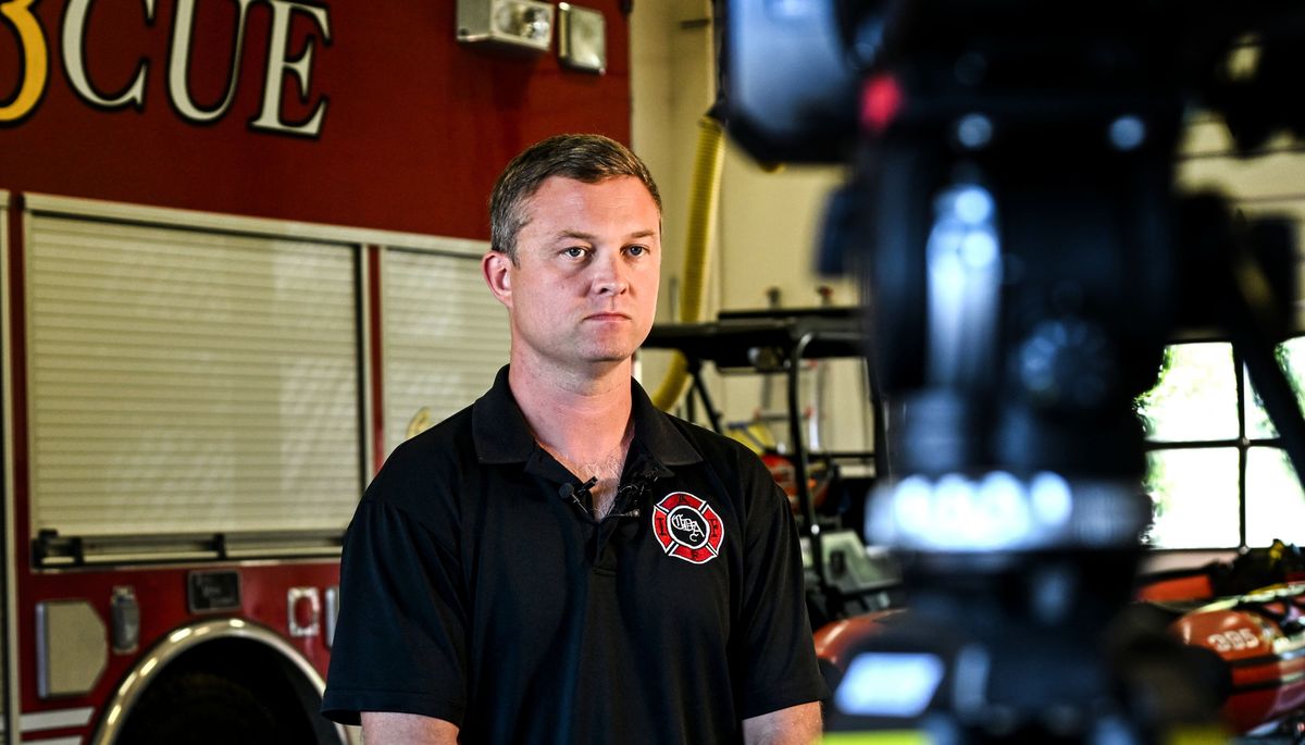 Coeur d’Alene Firefighters IAFF Local 710 Union President Gabe Eckert listens to questions Monday during a news conference at Station 3 in Coeur d’Alene, while giving an update about injured firefighter Dave Tysdal. Tysdal was shot and injured, and Battalion Chief John Morrison and Kootenai County Fire and Rescue Battalion Chief Frank Harwood were killed in an ambush while fighting a fire on Canfield Mountain on June 29.  (Kathy Plonka/The Spokesman-Review)