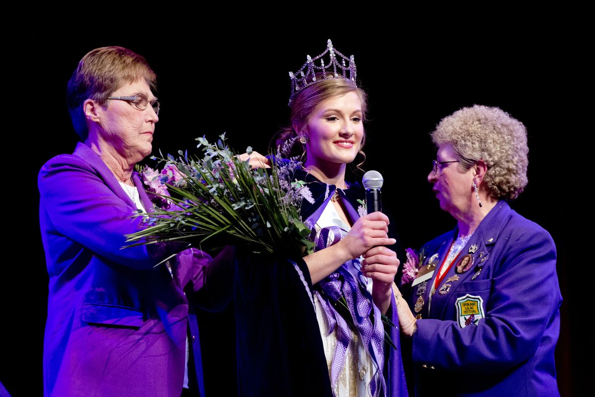 Kaylee Pearson, center, is given the tiara and flowers of the 2014 Lilac Queen after she was announced the winner Sunday. (Jesse Tinsley)