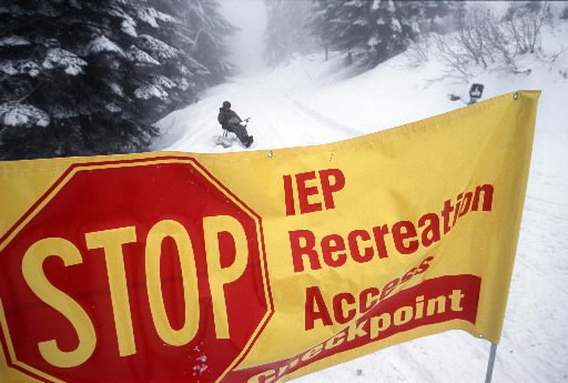 In 2004, Inland Empire Paper Company attempted to charge a fee for snowmobile access to their lands on Mount Spokane and educate riders about the need to stay on designated trails.  The program has failed to keep the riders from going off trail into clearcuts where they damage the tops of young trees. This winter, IEP is closing its lands to snowmobiling. A barricade fence will be set up at this access point to Linder Road near the cross-country ski trails. (Rich Landers)