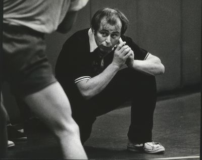 John Owen, seen coaching the North Idaho College wrestling team in 1985, died Thursday after suffering a stroke in late December. He was 75.  (Spokesman-Review Photo Archive)