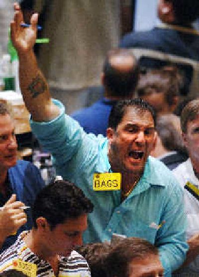 
A trader shouts his order Monday in the oil futures pit of the New York Mercantile Exchange.  
 (Associated Press / The Spokesman-Review)