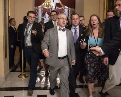 House Chief Deputy Whip Rep. Patrick T. McHenry, R-N.C., is surrounded by reporters as he walks to the chamber for votes on an immigration bill crafted by GOP conservatives, at the Capitol in Washington, Thursday, June 21, 2018. The bill was defeated and Republican leaders delayed a planned vote on a compromise GOP package with the party’s lawmakers fiercely divided over an issue that has long confounded the party. (J. Scott Applewhite / Associated Press)