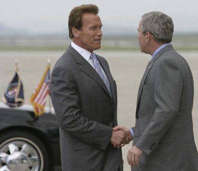 
Gov. Arnold Schwarzenegger greets President Bush at Moffett Field in Mountain View, Calif. Bush arrived Friday for a four-day trip to California and Las Vegas. 
 (Associated Press / The Spokesman-Review)