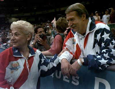 In this July 23, 2004, file photo, Martha and Bela Karolyi watch together as the U.S. womens gymnastic team celebrates winning the gold medal at the Centennial Summer Olympic Games in Atlanta. (AMY SANCETTA / Associated Press)