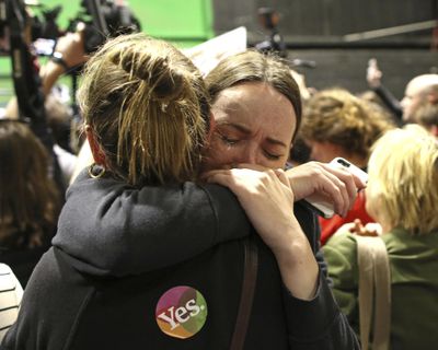 People from the “Yes” campaign react as the results of the votes begin to come in, after the Irish referendum on the 8th Amendment of the Irish Constitution at the RDS count centre, in Dublin, Ireland, Saturday, May 26, 2018. A leading anti-abortion group says Ireland’s historic abortion referendum has resulted in a “tragedy of historic proportions” in a statement that all but admits defeat, as two exit polls predict an overwhelming victory for those seeking to overturn the country’s strict ban on terminations. (Peter Morrison / Associated Press)